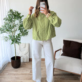Veste à pois verte