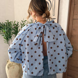 Blouse à pois dos nu bleu