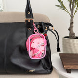 Porte clé avec houppettes rose
